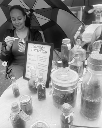 picture of strange terrarium founder Caroline smiling and looking to the left